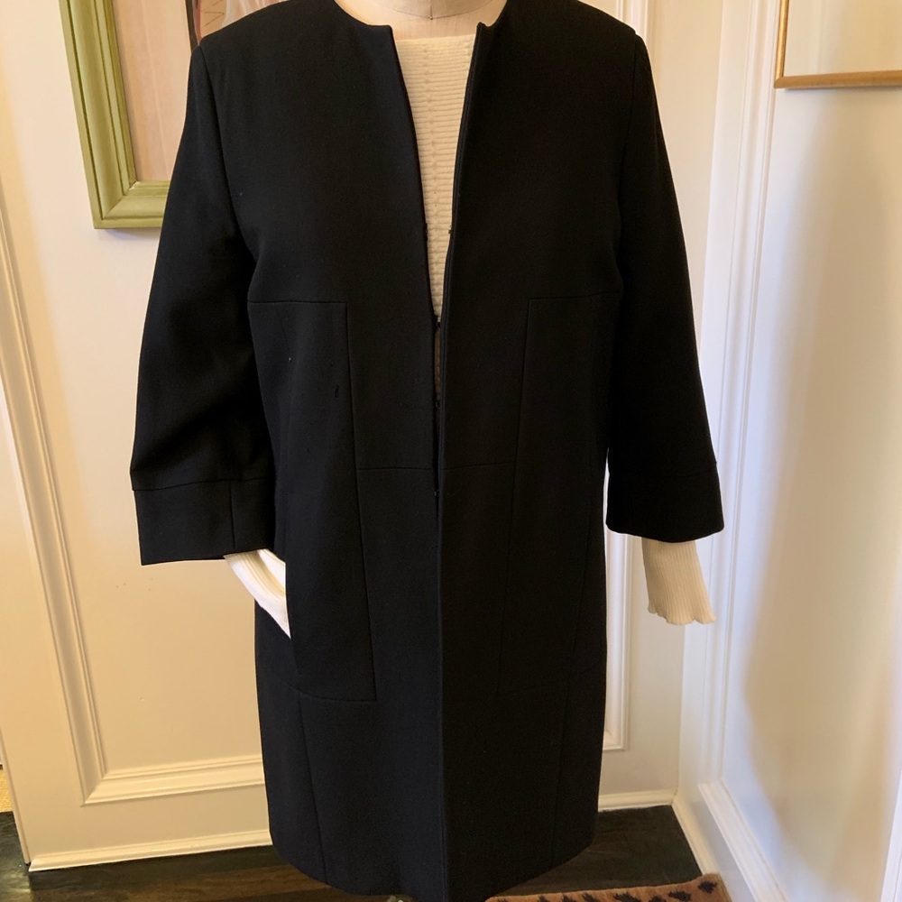 Black finger tip length jacket